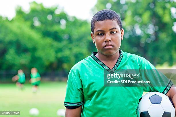 sad soccer player after game loss - football player face stock pictures, royalty-free photos & images
