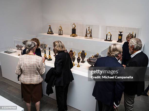 Guests attend the opening of the "Porphyry: The Royal Stone" exhibition at Sven-Harrys art museum on September 27, 2016 in Stockholm, Sweden.