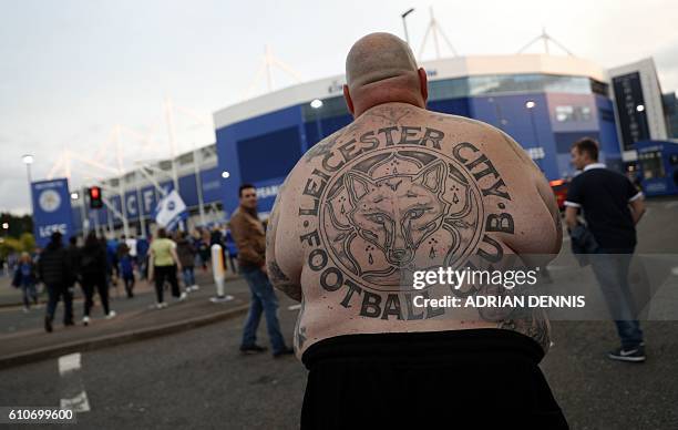 Leicester City fan and drummer Lee Jobber arrives ahead of the UEFA Champions League group G football match between Leicester City and Porto at the...