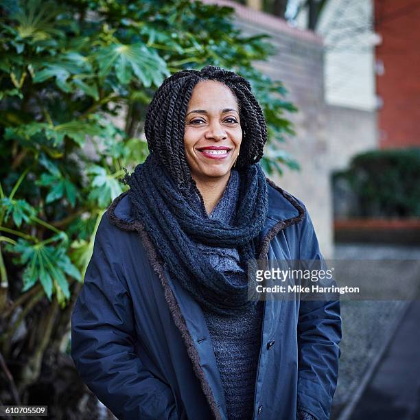 mature black female outside - leanincollection stockfoto's en -beelden