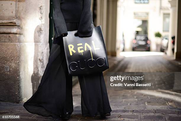 Yuri Nakagawa poses with a Gucci bag after the Aalto show at the Espace Commines during Paris Fashion Week Womenswear SS17 on September 27, 2016 in...