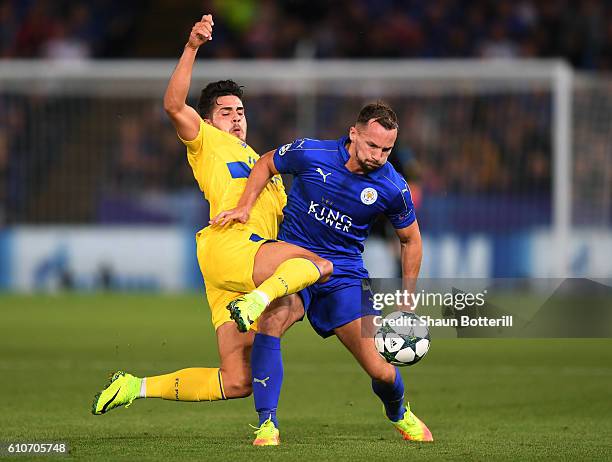 Daniel Drinkwater of Leicester City battles with Andre Silva of FC Porto during the UEFA Champions League Group G match between Leicester City FC and...