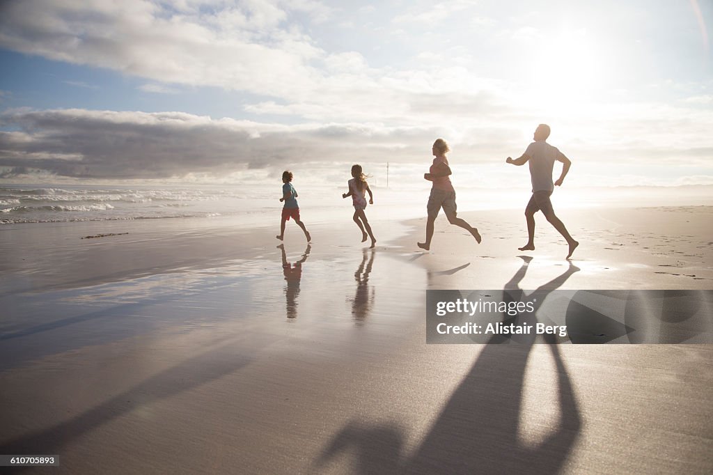 Family playing together on a beach