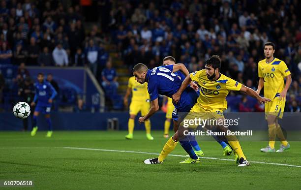 Islam Slimani of Leicester City scores their first goal during the UEFA Champions League Group G match between Leicester City FC and FC Porto at The...