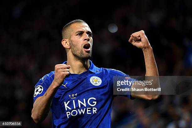 Islam Slimani of Leicester City celebrates as he scores their first goal during the UEFA Champions League Group G match between Leicester City FC and...