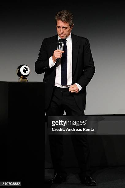 Hugh Grant speaks after receiving his ward at the 'Florence Foster Jenkins' Premiere and Golden Icon award ceremony during the 12th Zurich Film...