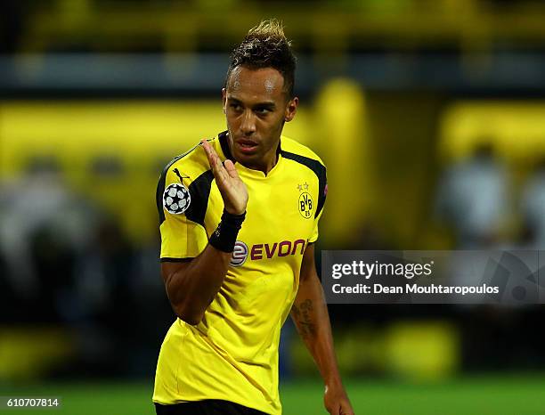 Pierre-Emerick Aubameyang of Borussia Dortmund celebrates as he scores their first goal during the UEFA Champions League Group F match between...