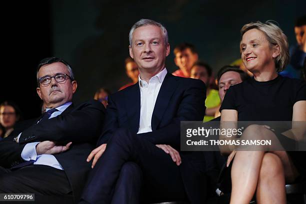 French right-wing Les Republicains candidate for the LR party primaries ahead of the 2017 presidential election, Bruno Le Maire , next to member of...