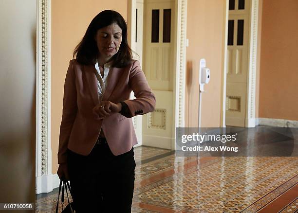 Sen. Kelly Ayotte comes out from the Senate Republican weekly policy luncheon at the Capitol September 27, 2016 in Washington, DC. Senate GOP members...