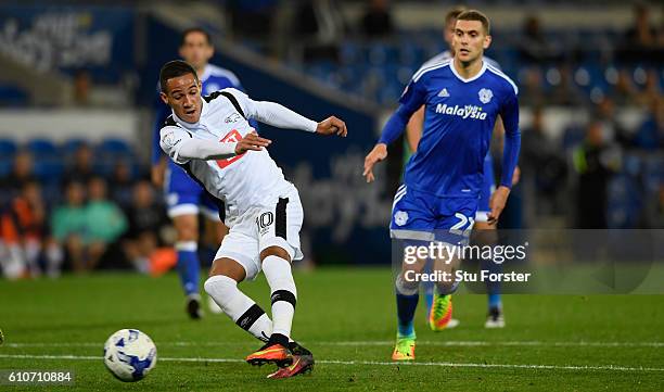 Derby player Tom Ince shoots to score the opening goal during the Sky Bet Championship match between Cardiff City and Derby County at Cardiff City...