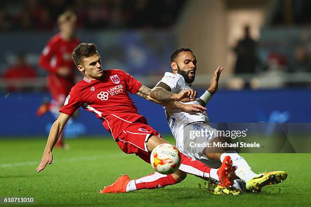 Jamie Paterson of Bristol City has a shot blocked by Kyle Bartley of Leeds United during the Sky Bet Championship match between Bristol City and...