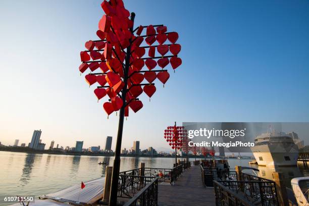 love station near dragon river bridge ( rong bridge) in sunset in da nang, vietnam. - modern vietnam imagens e fotografias de stock