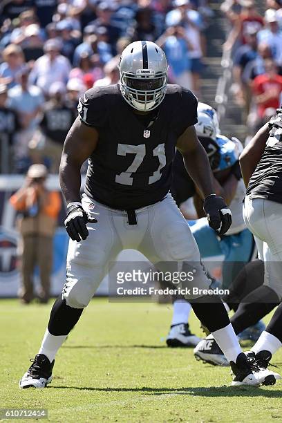 Menelik Watson of the Oakland Raiders plays against the Tennessee Titans at Nissan Stadium on September 25, 2016 in Nashville, Tennessee.
