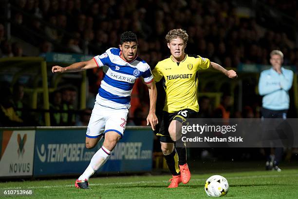 Matt Palmer of Burton Albion and Massimo Luongo of Queens Park Rangers in action during the Sky Bet Championship match between Burton Albion and...