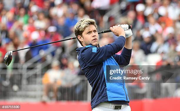 Minnesota , United States - 27 September 2016; One Direction singer Niall Horan watches his drive from the 1st tee box before their round of the...