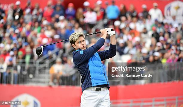 Minnesota , United States - 27 September 2016; One Direction singer Niall Horan watches his drive from the 1st tee box before their round of the...