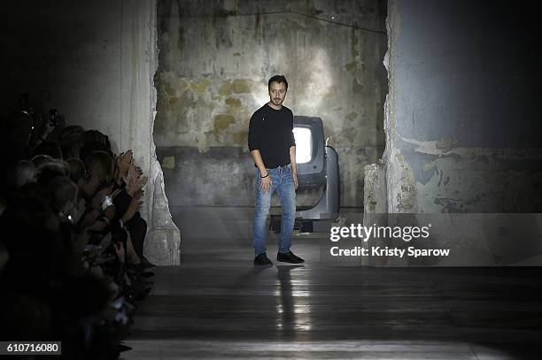 Creative Director Anthony Vaccarello acknowledges the audience during the Saint Laurent show as part of Paris Fashion Week Womenswear Spring/Summer...