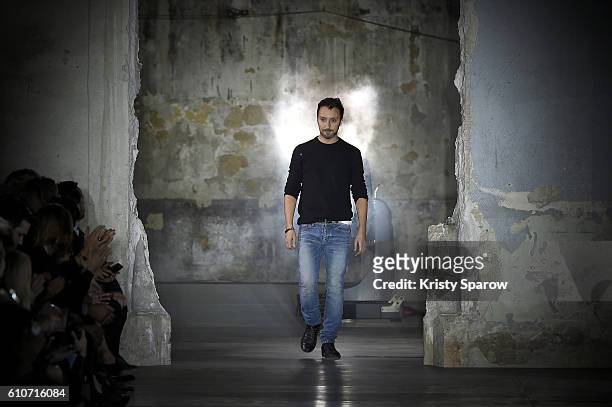 Creative Director Anthony Vaccarello acknowledges the audience during the Saint Laurent show as part of Paris Fashion Week Womenswear Spring/Summer...