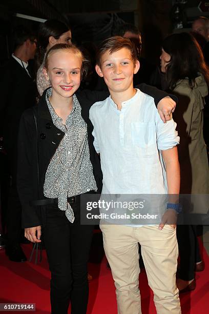 Jule Hermann and Ivo Pietzcker during the premiere of the film 'Nebel im August' at City Kino on September 27, 2016 in Munich, Germany.