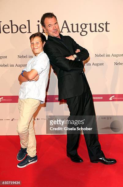 Ivo Pietzcker and Sebastian Koch during the premiere of the film 'Nebel im August' at City Kino on September 27, 2016 in Munich, Germany.