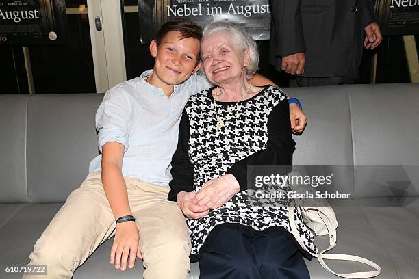 Ivo Pietzcker and Amalie Speidl, sister of Ernst Lossa, during the premiere of the film 'Nebel im August' at City Kino on September 27, 2016 in...