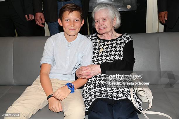 Ivo Pietzcker and Amalie Speidl, sister of Ernst Lossa, during the premiere of the film 'Nebel im August' at City Kino on September 27, 2016 in...