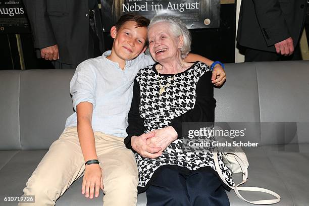 Ivo Pietzcker and Amalie Speidl, sister of Ernst Lossa, during the premiere of the film 'Nebel im August' at City Kino on September 27, 2016 in...