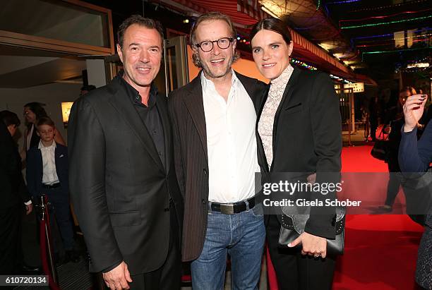 Sebastian Koch, Kai Wessel and Fritzi Haberlandt during the premiere of the film 'Nebel im August' at City Kino on September 27, 2016 in Munich,...