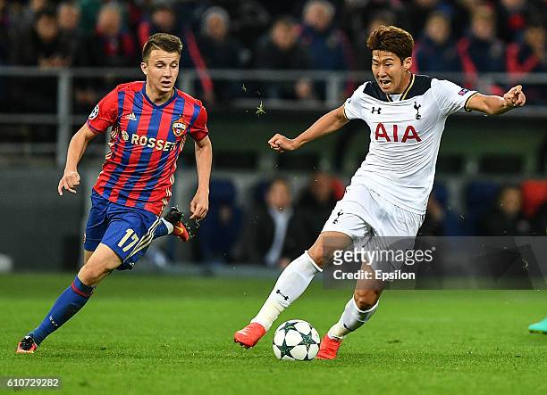 Aleksandr Golovin of CSKA Moscow vies for the ball with Heung-Min Son of Tottenham Hotspur FC during the UEFA Champions League match between PFC CSKA...