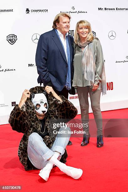 Rapper Cro, german singer Howard Carpendale and his girlfriend Donnice Pierce attend the 'Unsere Zeit ist jetzt' World Premiere at CineStar on...