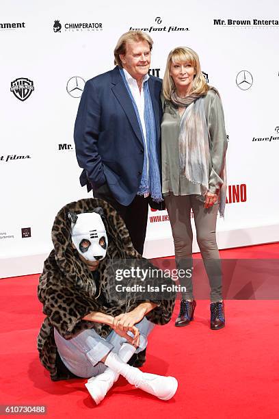 Rapper Cro, german singer Howard Carpendale and his girlfriend Donnice Pierce attend the 'Unsere Zeit ist jetzt' World Premiere at CineStar on...