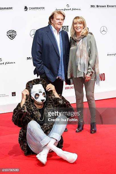 Rapper Cro, german singer Howard Carpendale and his girlfriend Donnice Pierce attend the 'Unsere Zeit ist jetzt' World Premiere at CineStar on...