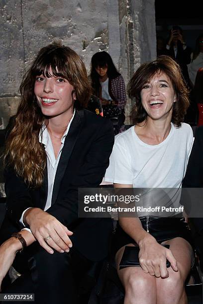 Lou Doillon and her sister Charlotte Gainsbourg attend the Saint Laurent show as part of the Paris Fashion Week Womenswear Spring/Summer 2017 on...