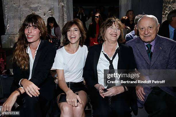 Lou Doillon, her sister Charlotte Gainsbourg, their mother Jane Birkin and Pierre Berge attend the Saint Laurent show as part of the Paris Fashion...