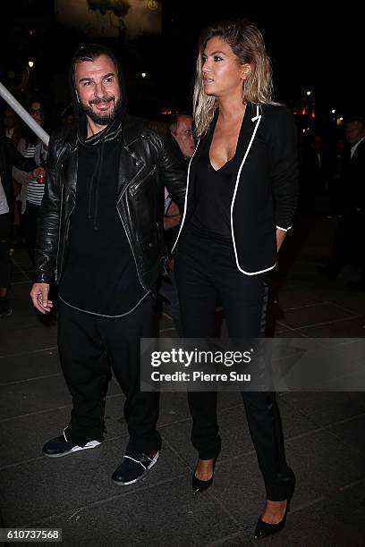 Michael Youn and Isabelle Funaro arrive at the Etam show as part of the Paris Fashion Week Womenswear Spring/Summer 2017 on September 27, 2016 in...