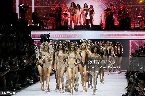 Models walk the runway during the Etam show as part of the Paris Fashion Week Womenswear Spring/Summer 2017 on September 27, 2016 in Paris, France.