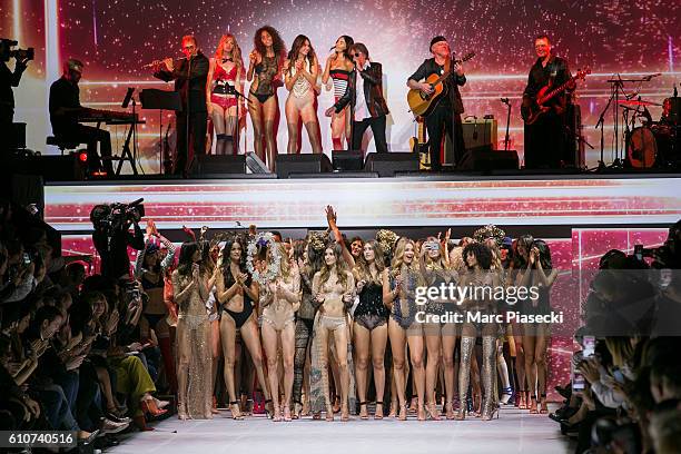 Models walk the runway during the Etam show as part of the Paris Fashion Week Womenswear Spring/Summer 2017 on September 27, 2016 in Paris, France.