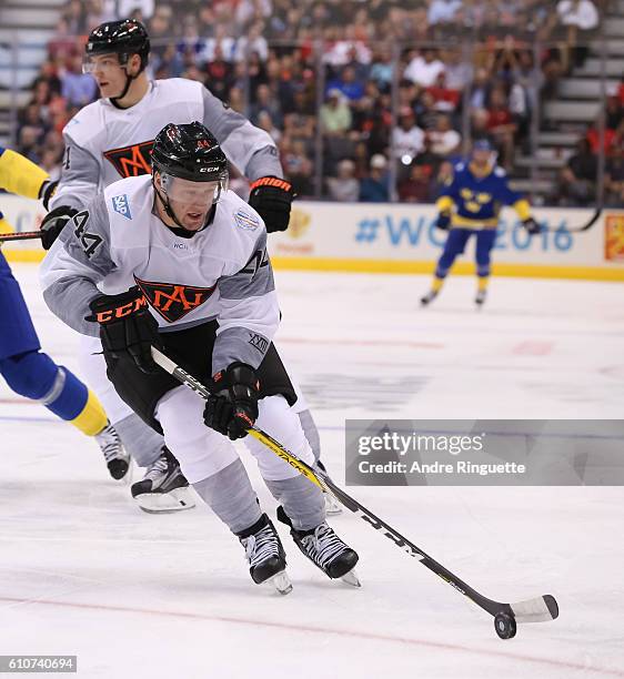 Morgan Rielly of Team North America stickhandles the puck against Team Sweden during the World Cup of Hockey 2016 at Air Canada Centre on September...