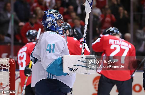 Jaroslav Halak of Team Europe looks on as Team Canada celebrates a first period goal during Game One of the World Cup of Hockey final series at the...