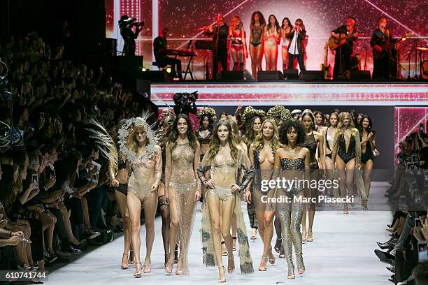 Models walk the runway during the Etam show as part of the Paris Fashion Week Womenswear Spring/Summer 2017 on September 27, 2016 in Paris, France.