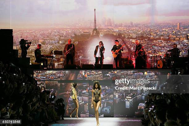 Model walks the runway during the Etam show as part of the Paris Fashion Week Womenswear Spring/Summer 2017 on September 27, 2016 in Paris, France.