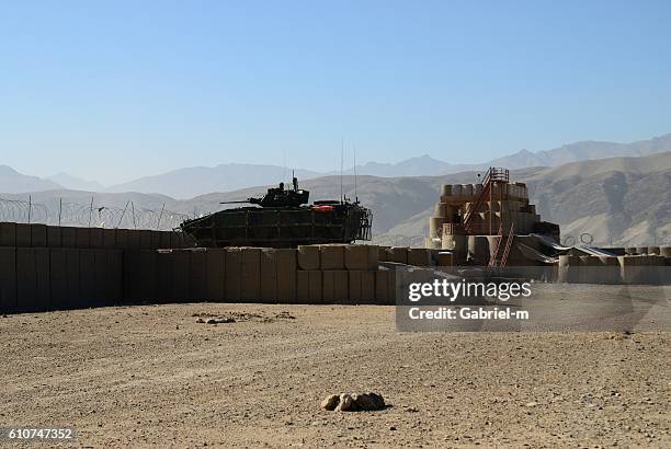 armored tank at military battlefield - military operations in afghanistan imagens e fotografias de stock