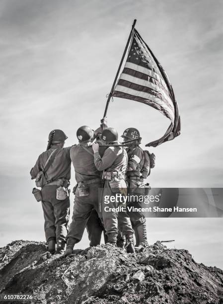 soldiers raising the us flag - world war ii stock pictures, royalty-free photos & images