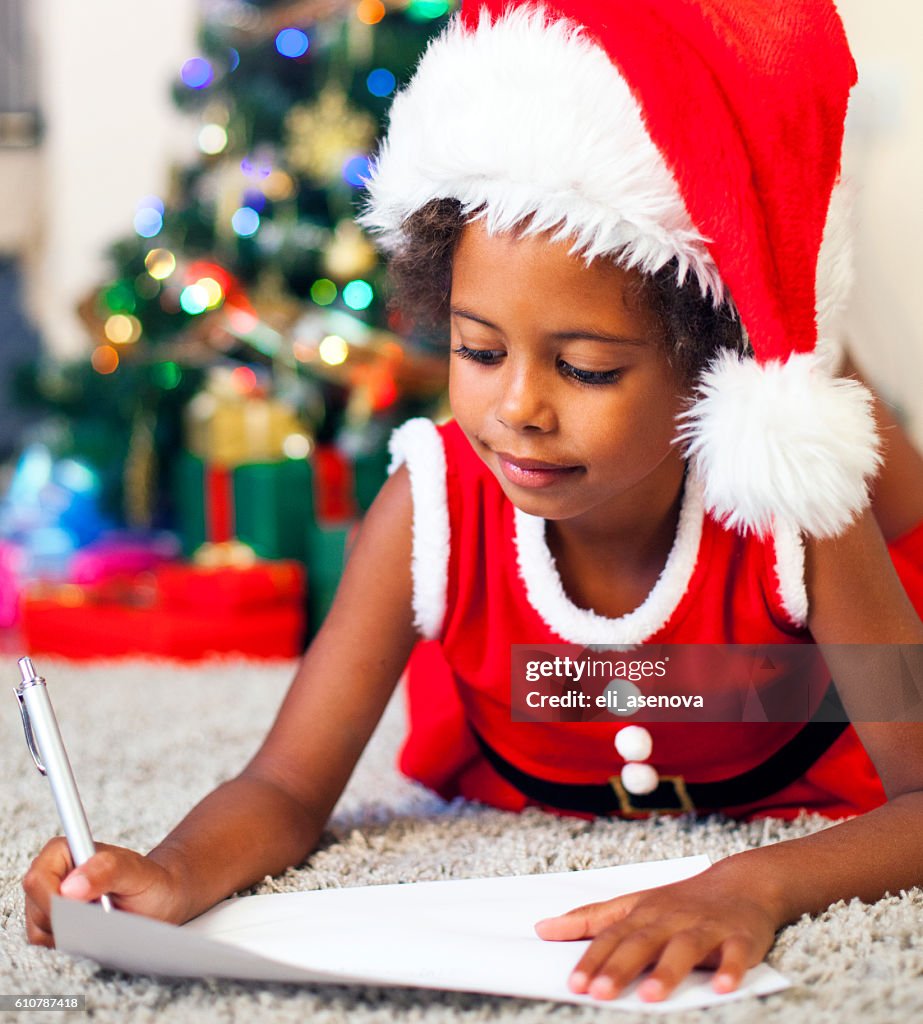 Christmas African American Child Writing a Letter to Santa Claus