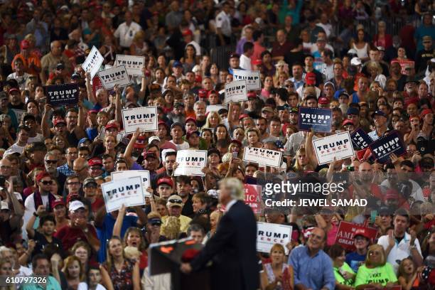 Republican presidential nominee Donald Trump speaks during a campaign rally at the Orlando Melbourne International Airport in Melbourne, Florida, on...