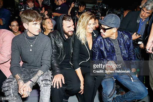 Gabriel Kane Day Lewis, Michael Youn, his wife Isabelle Funaro and Joey Starr attend the Etam show as part of the Paris Fashion Week Womenswear...