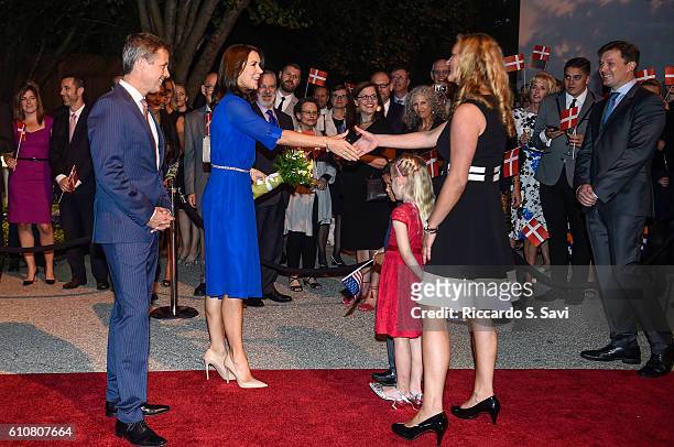 Crown Prince Frederick of Denmark and Crown Princess Mary of Denmark are greeted at the Danish ambassador's residence on September 27, 2016 in...
