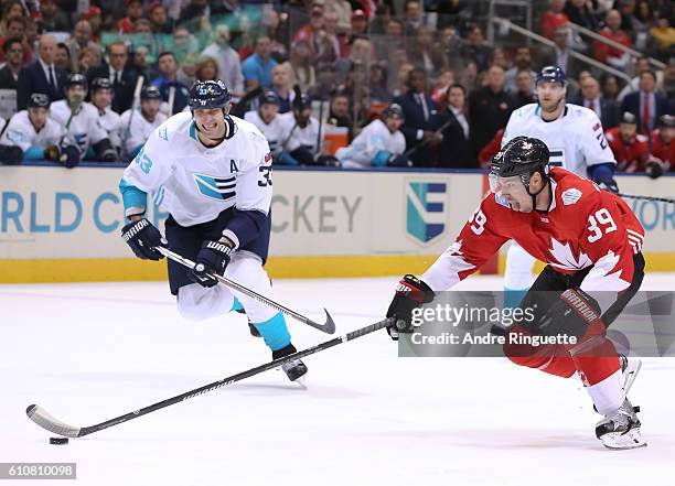 Logan Couture of Team Canada stickhandles the puck in on Team Europe during Game One of the World Cup of Hockey final series at the Air Canada Centre...