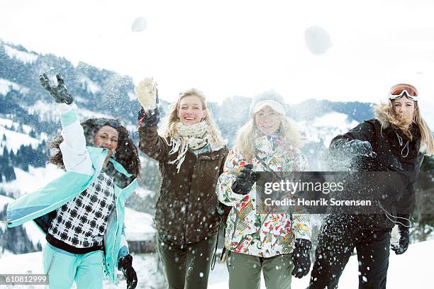 young women on winter holiday - casaco de esqui imagens e fotografias de stock