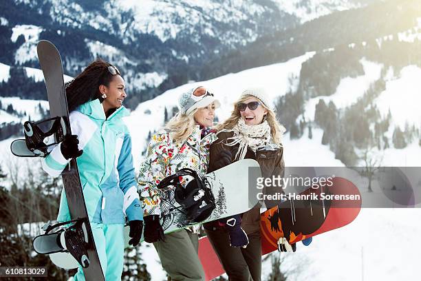 young women on winter holiday - calças para esquiar imagens e fotografias de stock